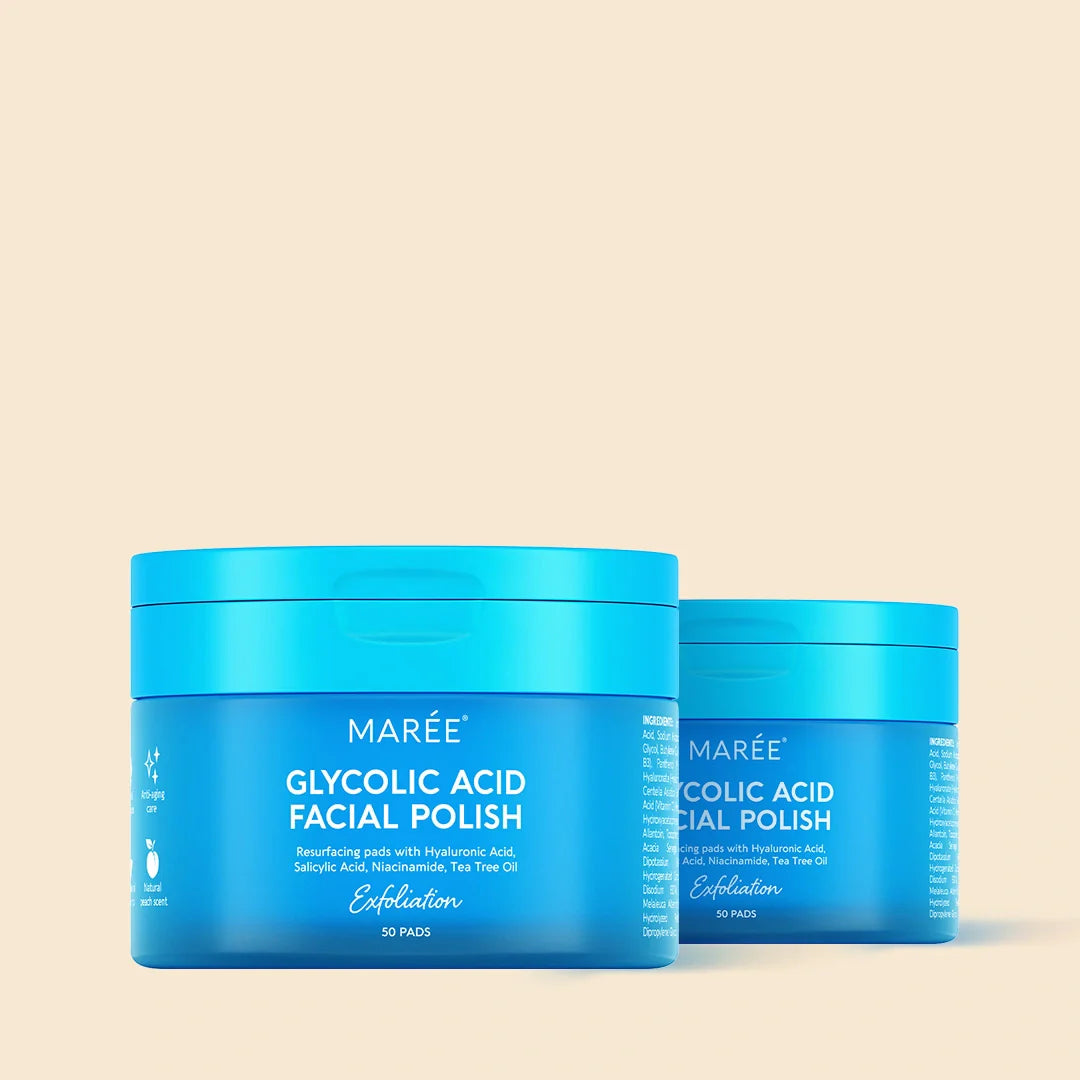Two blue containers of Marée Glycolic Acid Facial Polish on a beige background