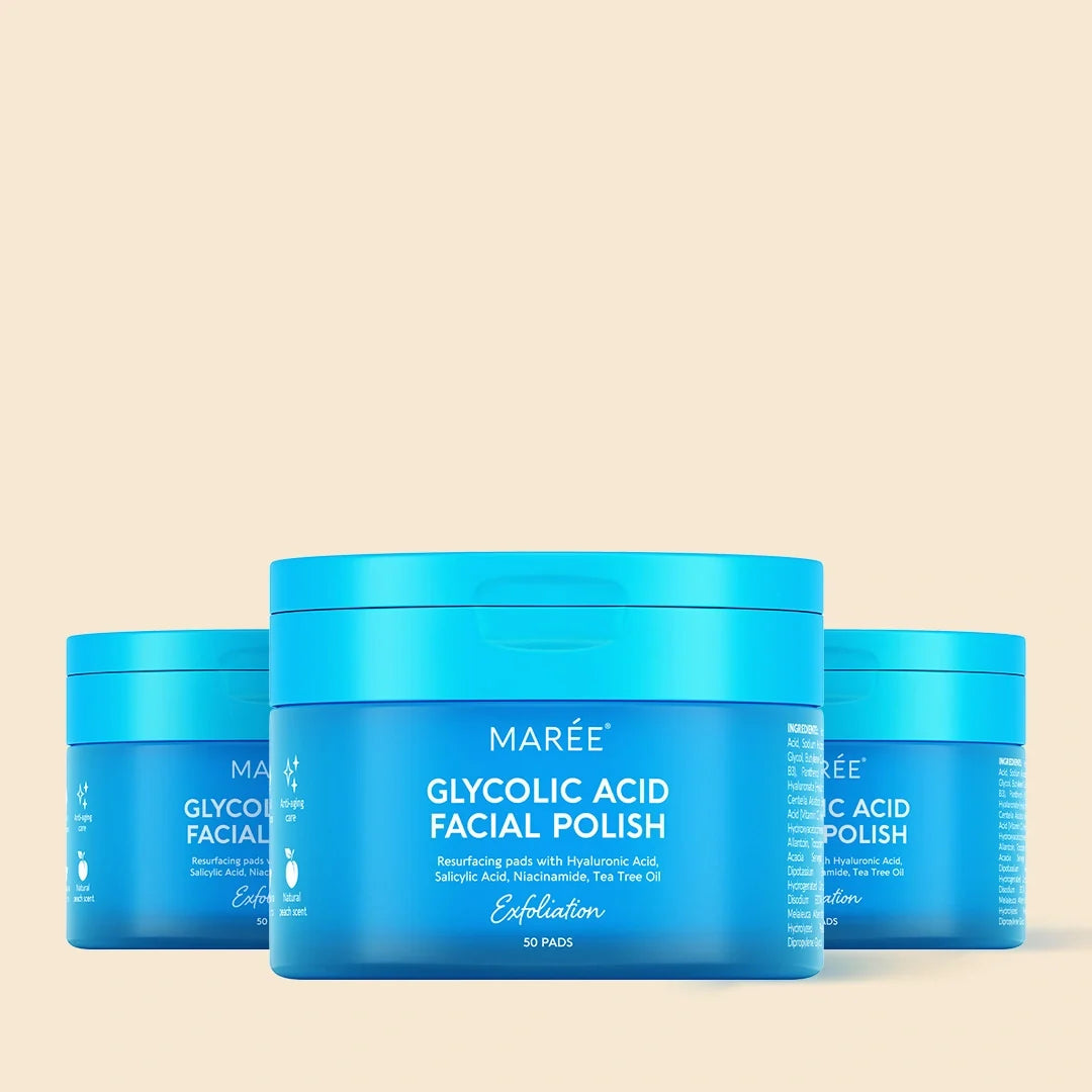 Three blue jars of MARÉE Glycolic Acid Facial Polish arranged in a row against a solid pale beige background.