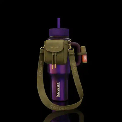 Purple water bottle with green carrying strap on a black background