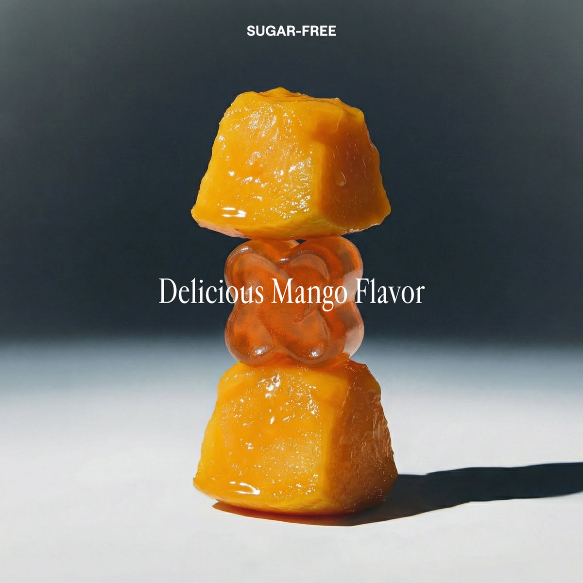 Yellow candy on a black background with 'SUGAR-FREE' and 'Delicious Mango Flavor' text.