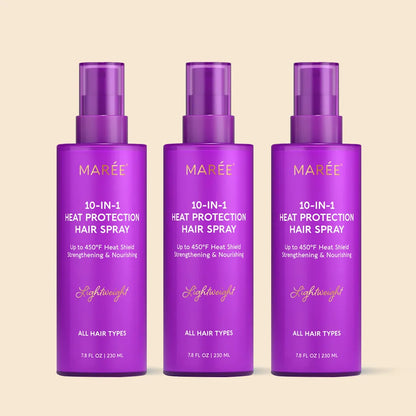 Three bottles of Maree 10-in-1 heat protection hair spray on a beige background