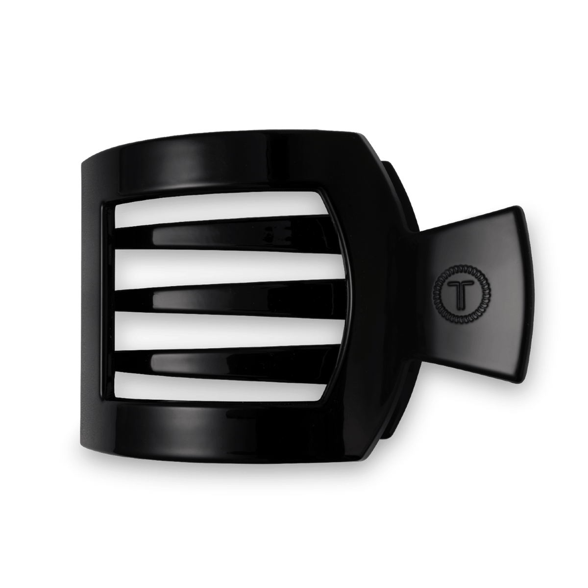A glossy black hair claw clip with horizontal slats on the front and a side tab featuring an embossed 'T' logo, shown against a plain white background.