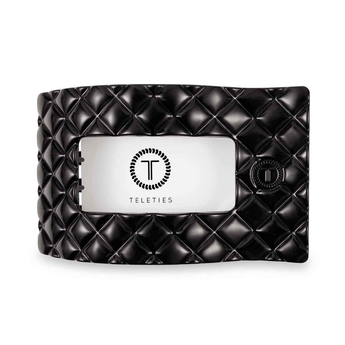 TELETIES Jet Black quilted hair clip shown open, with a branded label
