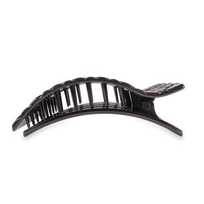 Black hair clip on a transparent background