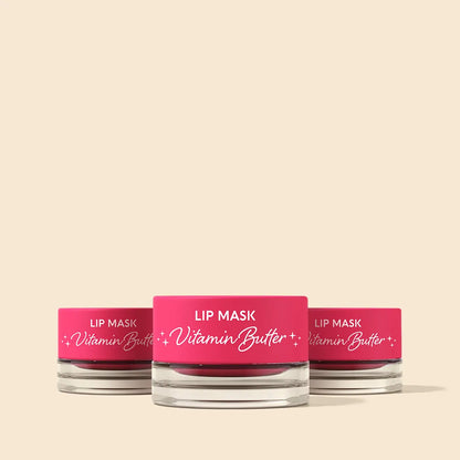 Three lip mask containers with pink labels on a beige background