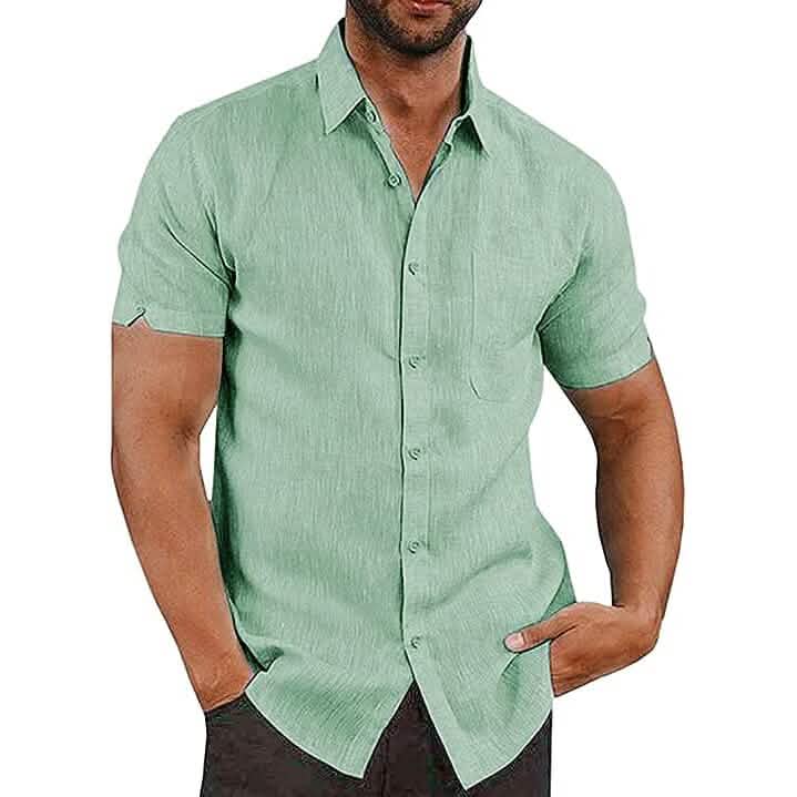 Man wearing a green short-sleeve shirt on a white background