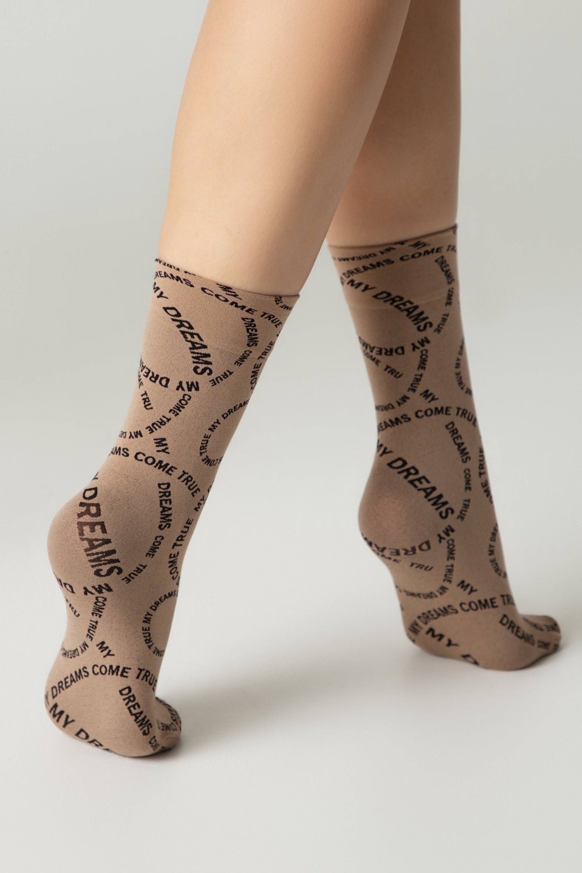 Conte Fantasy dense socks with knitted My dreams design, styled photo (3)