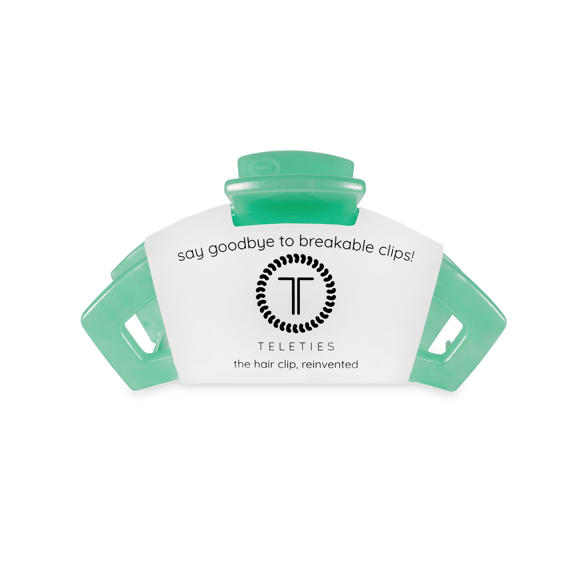 Green hair clip with Teleties branding on a white background