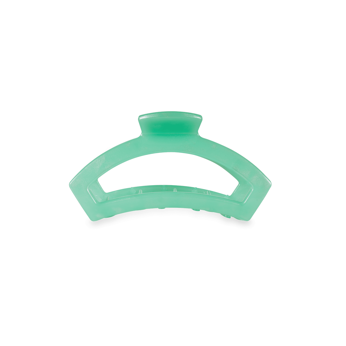 A mint green translucent hair claw clip on a solid white background.