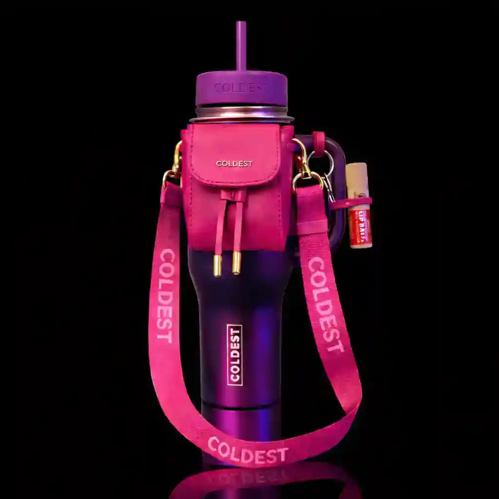 Purple water bottle with pink carrying strap and pouch on a black background