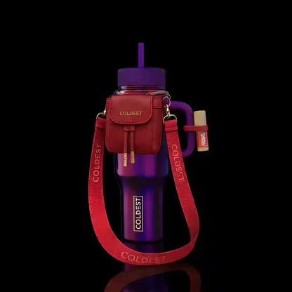 Purple water bottle with red carrying strap and case on a black background