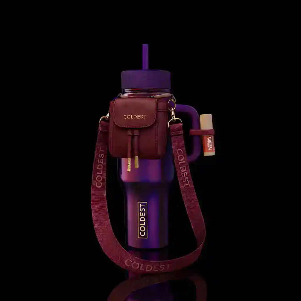 Purple water bottle with matching carrying case on a black background
