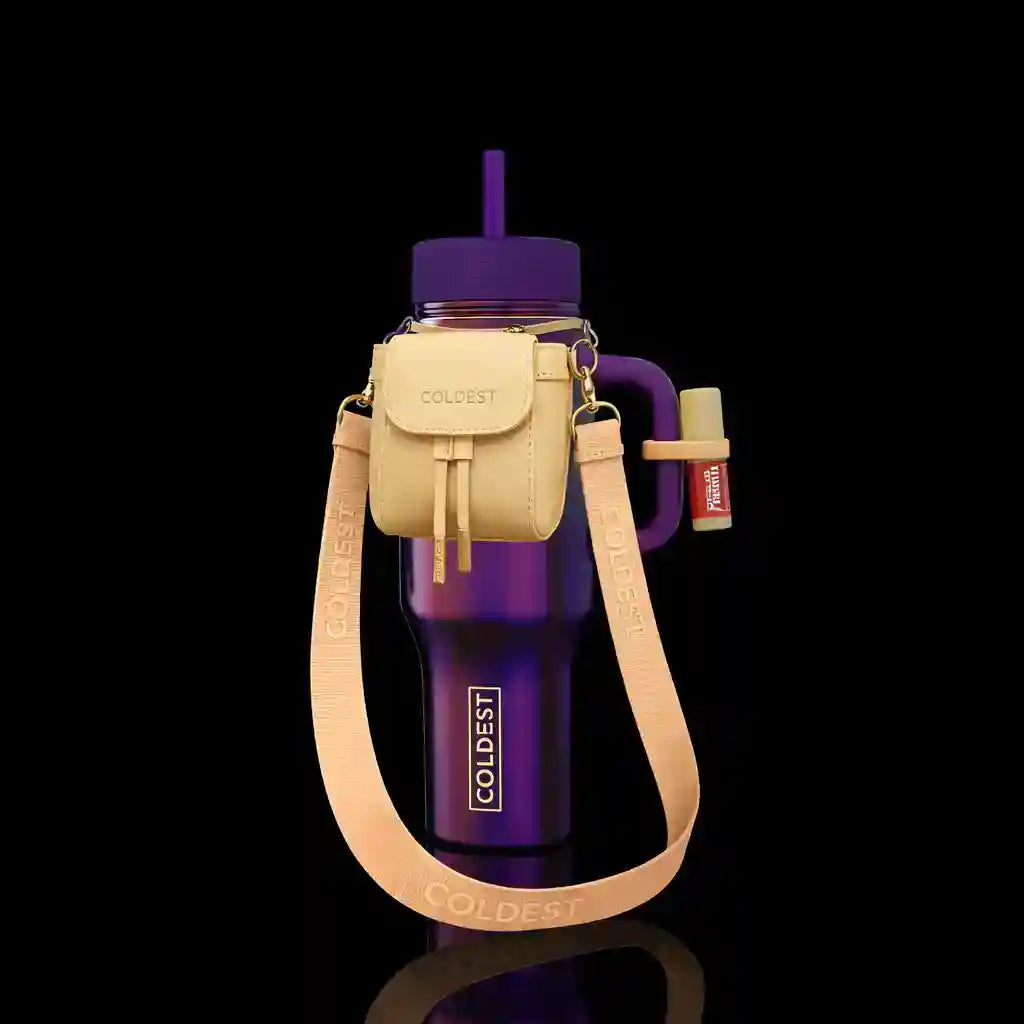 Purple water bottle with beige carrying case and strap on a black background