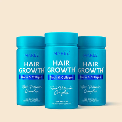 Three bottles of Marée Hair Growth Biotin & Collagen supplement on a beige background