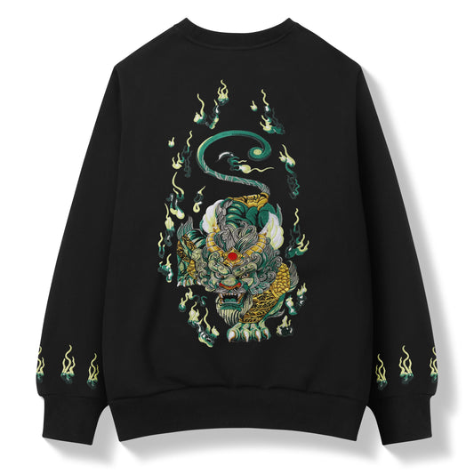 A black crewneck sweatshirt shown from the back, featuring a large, detailed graphic of a stylized tiger head surrounded by green flames and a coiled green dragon. The sleeves have small matching flame motifs near the cuffs.