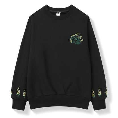 Black sweatshirt with green flame design on a white background