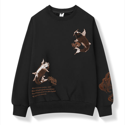 Black sweatshirt with embroidered designs on a white background