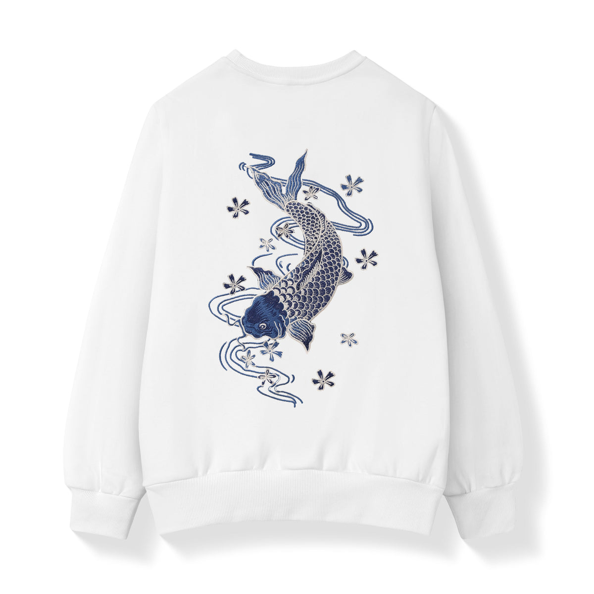 A white crewneck sweatshirt shown from the back, featuring a large graphic print of a koi fish in shades of blue and gray, surrounded by small floral motifs.