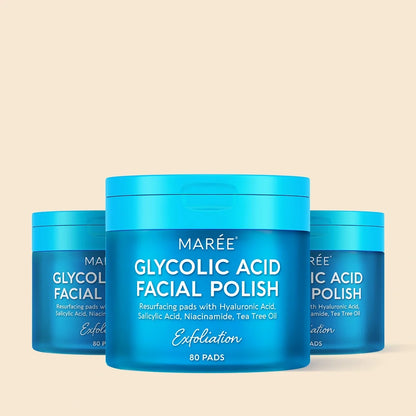 Blue containers of Maree Glycolic Acid Facial Polish on a beige background