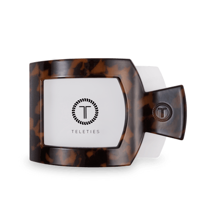 TELETIES Tortoise large flat square hair clip shown open, showing the white interior