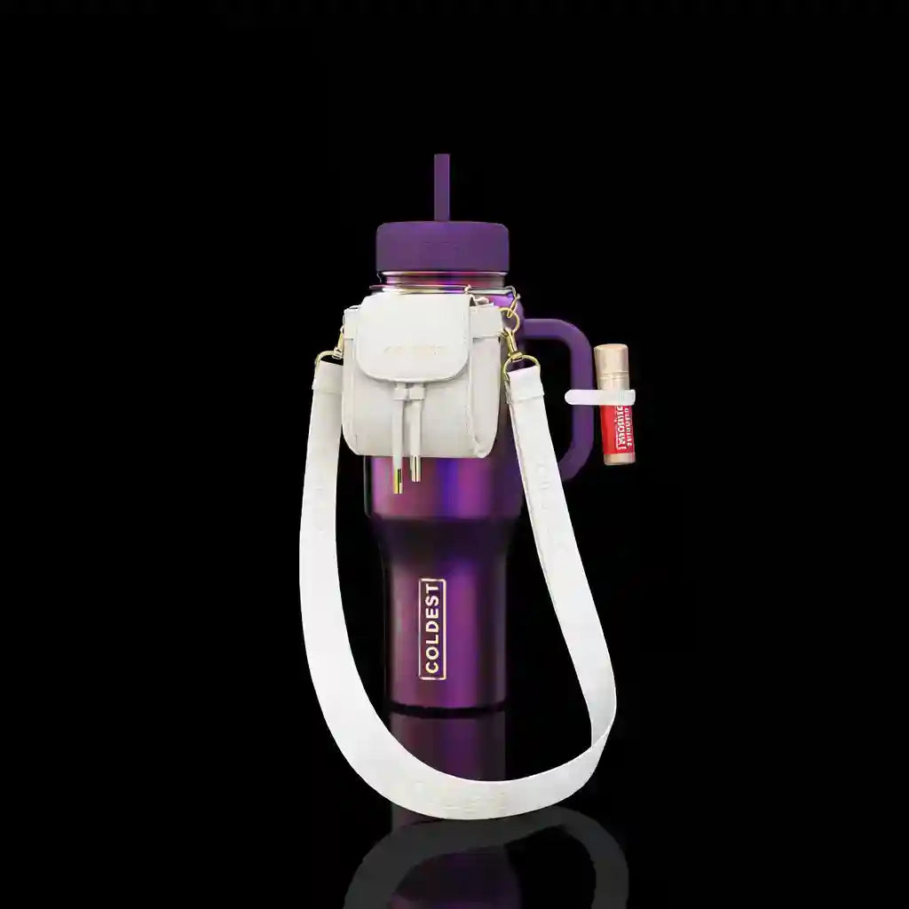 Purple water bottle with a white carrying case on a black background